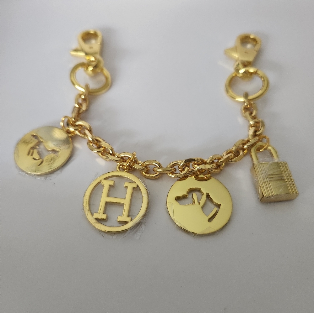 Hermès Gold Purse Charm Or Keychain. 8" Goldtone. - Picture 6 of 7